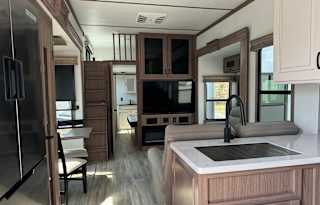 Brand NEW RV Featuring TWO Bedrooms and Full Bath